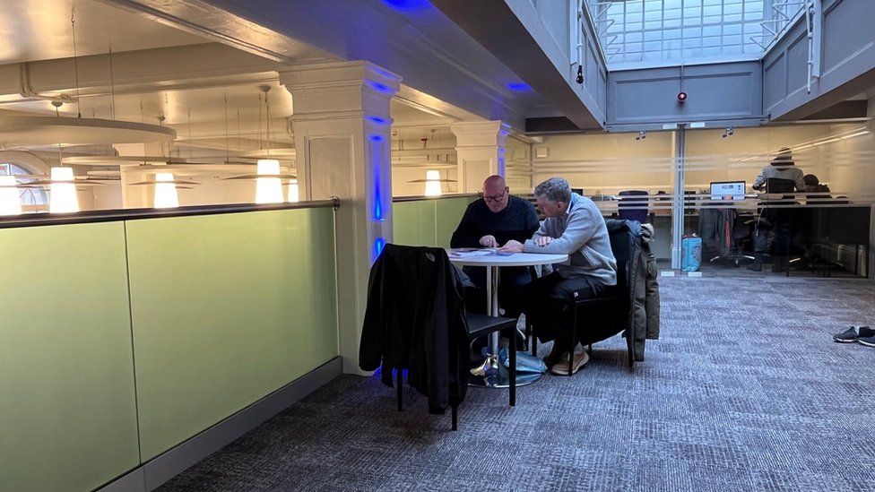 Graham and his Read Easy coach Geoff Bell hard at work at Hull's Central Library