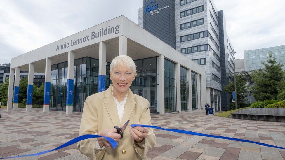 Anne Lennox outside Glasgow Caledonian University