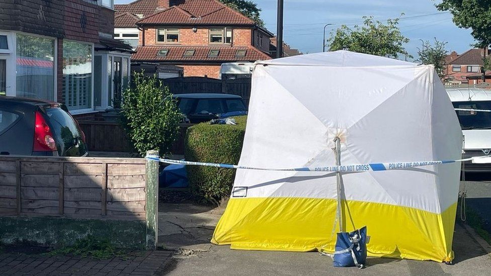 Police tent outside house
