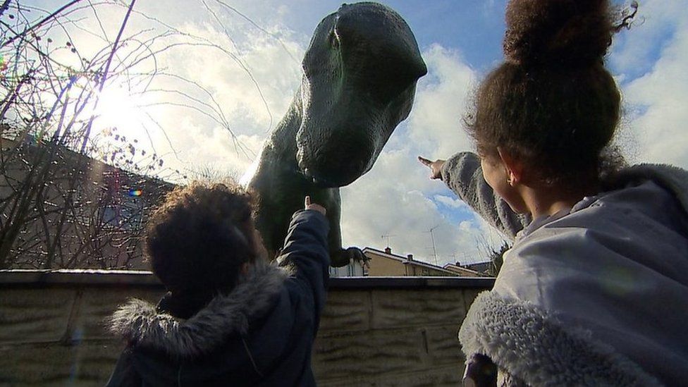 Cwmbran house with 15ft dinosaur in garden damaged by fire BBC News
