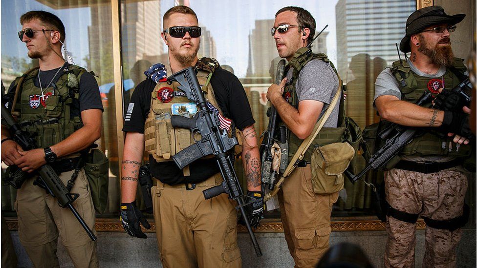West Ohio Minutemen, an armed militia, stand guard near Public Square during the second day of the 2016 Republican National Convention in Cleveland, Ohio, on July 19, 2016.
