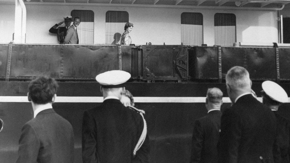 The Queen and Duke of Edinburgh walking along the decks of the Royal Yacht Britannia at the end of their first day in Cardiff - 5 August 1960
