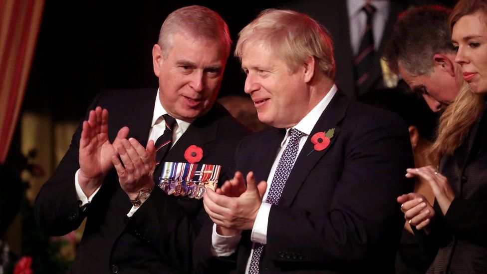 Prince Andrew chatting to Boris Johnson during the ceremony