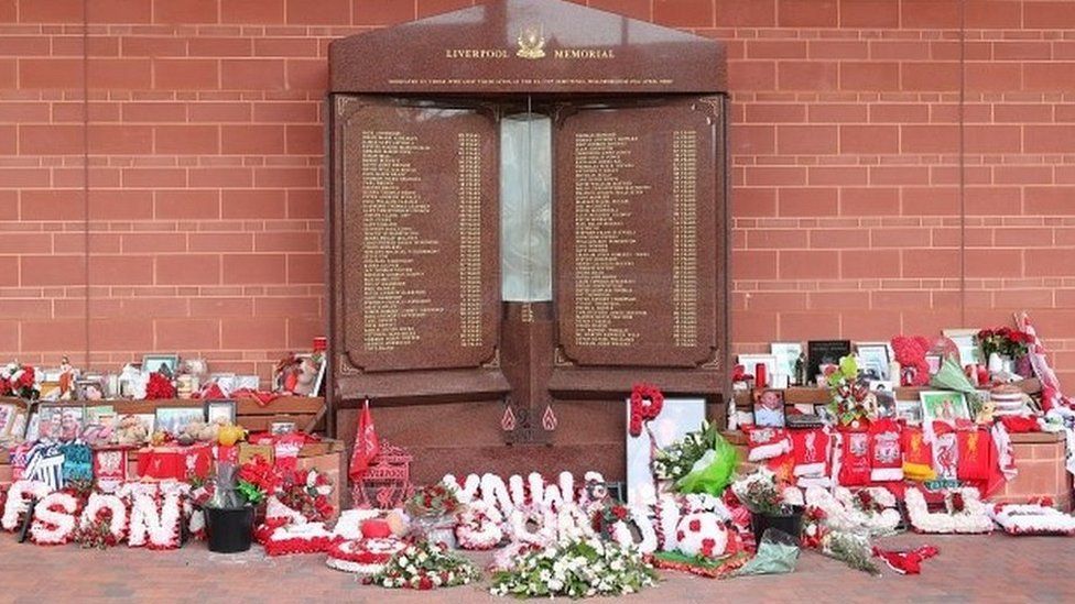Flowers and tributes left at the Hillsborough Memorial