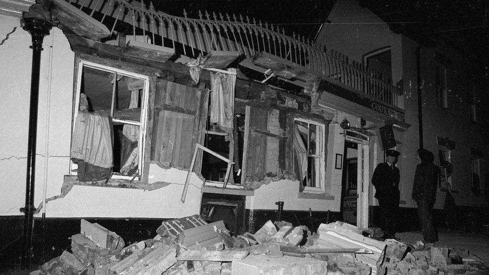 The aftermath of an IRA bomb at the Horse and Groom pub in Guildford, Surrey