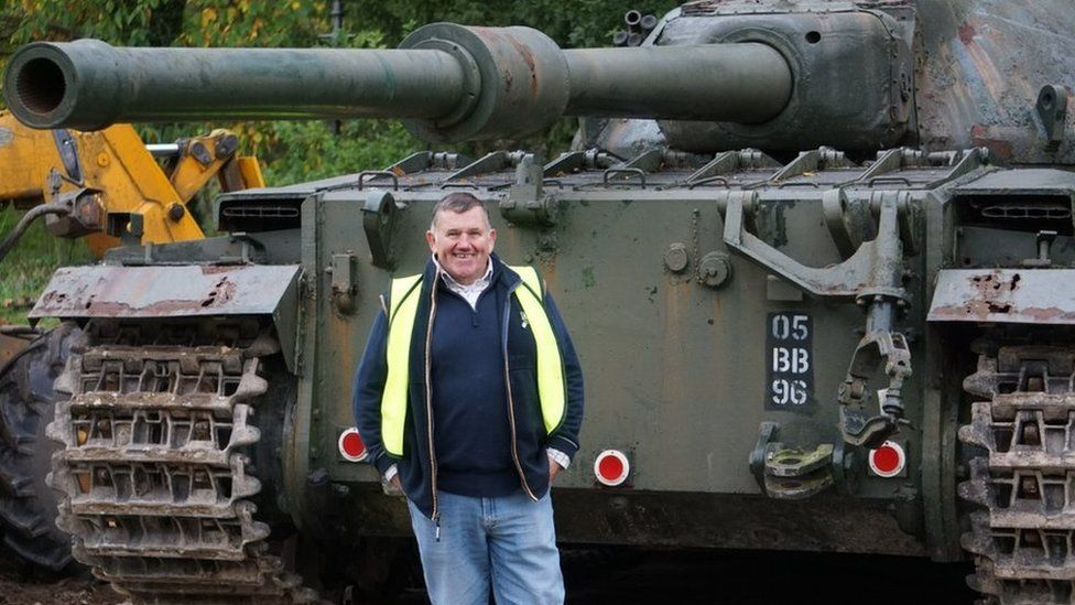 Curator Mick Holtby with the FV 214 Conqueror tank
