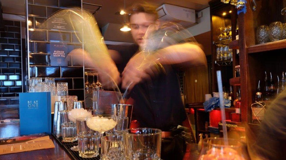 Be At One barman mixing cocktails