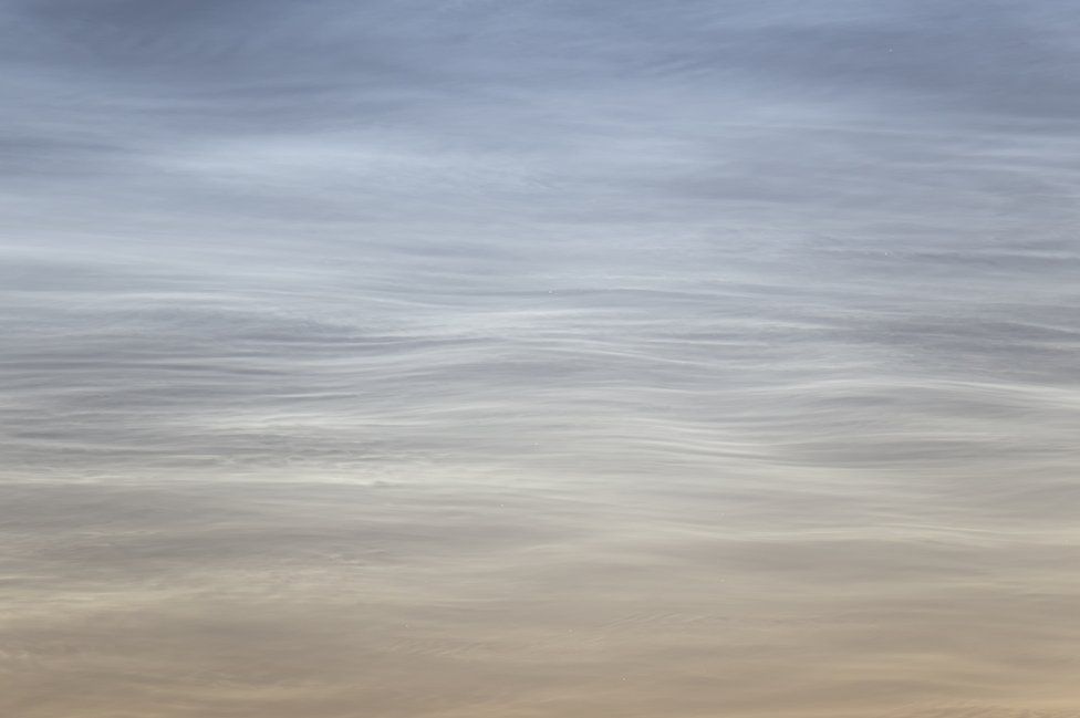 Silent Waves of the Sky: Noctilucent Clouds by Mikko Silvola