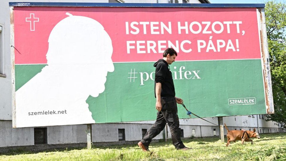 A billboard entreating Hungarians to welcome the Pope a day ahead of his visit to the country