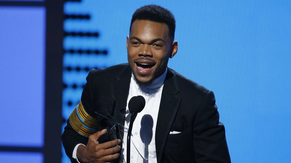 Chance the Rapper wins BET humanitarian award, presented by Michelle ...