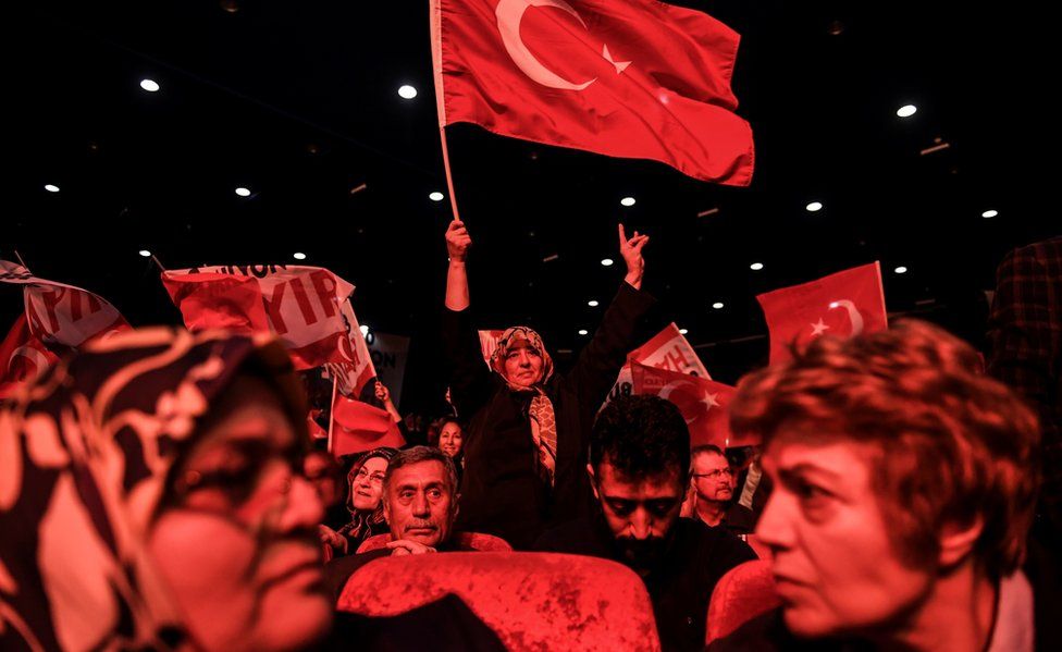 Supporters wait for Meral Aksener (not pictured) during a No campaign meeting on March 28, 2017, in Istanbul