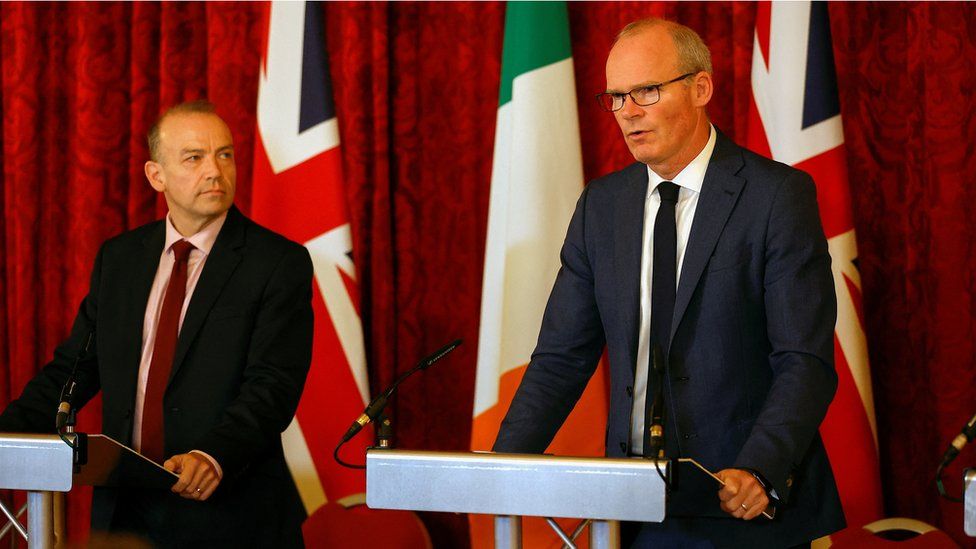 Ireland's Foreign Minister Simon Coveney and Secretary of State for Northern Ireland Chris Heaton-Harris attend a news conference, during the British-Irish Intergovernmental Conference