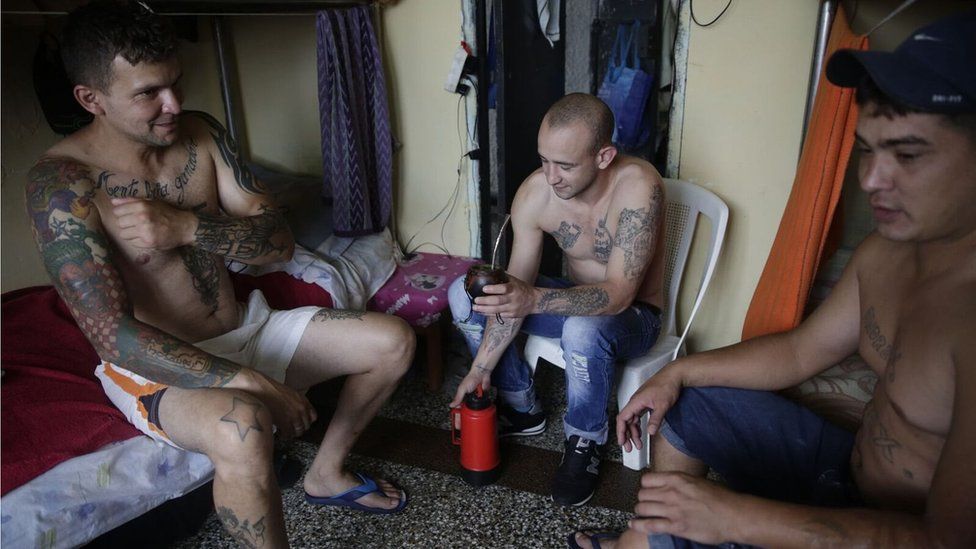Inmates at Punta de Rieles share a mate tea