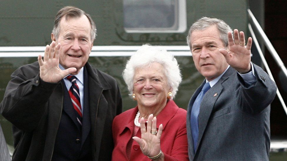 George Bush Snr, Barbara Bush and George Bush Jnr wave to the camera