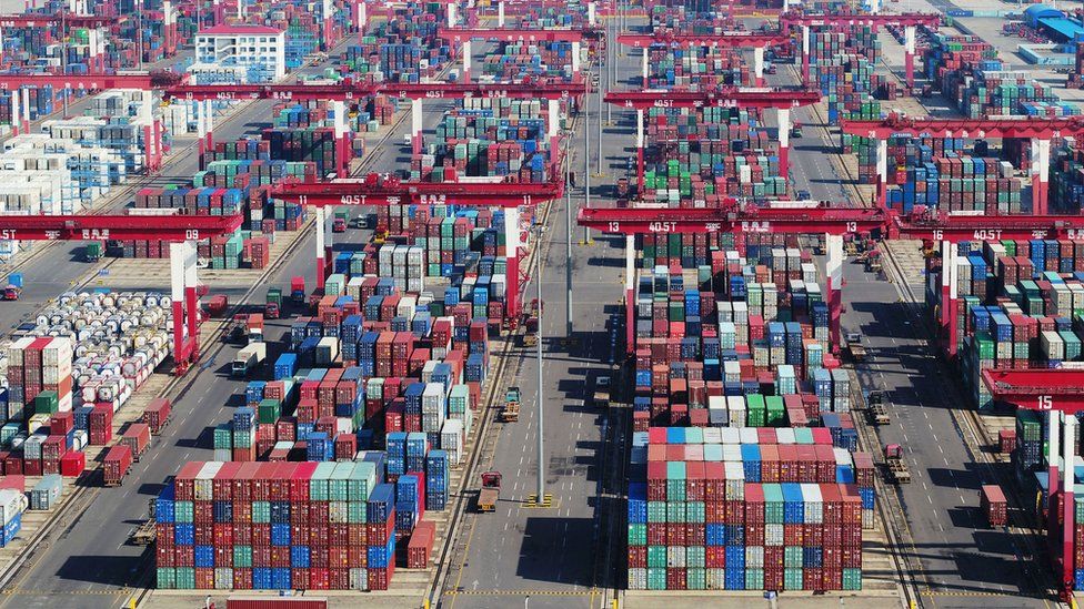 Containers sit stacked at Qingdao Port at Qingdao, Shandong Province of China