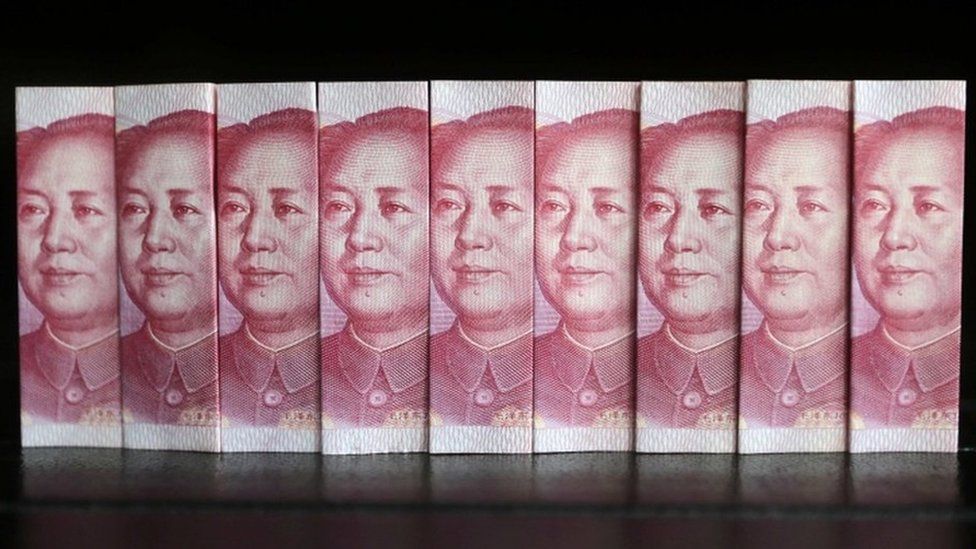 Chinese 100 Yuan banknotes are seen in this picture illustration taken in Beijing 11 July 2013