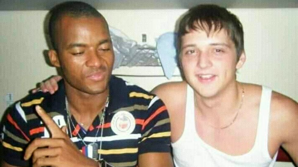 Prince Nkem Nduche (L) in Russia as a young man