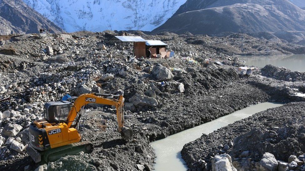 Draining work on Lake Imja