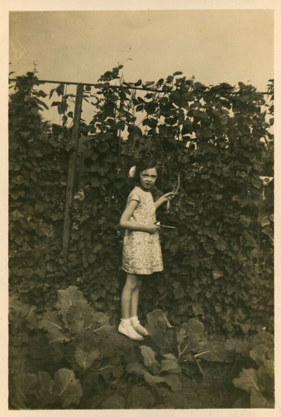 Jean Garner as a child in an allotment