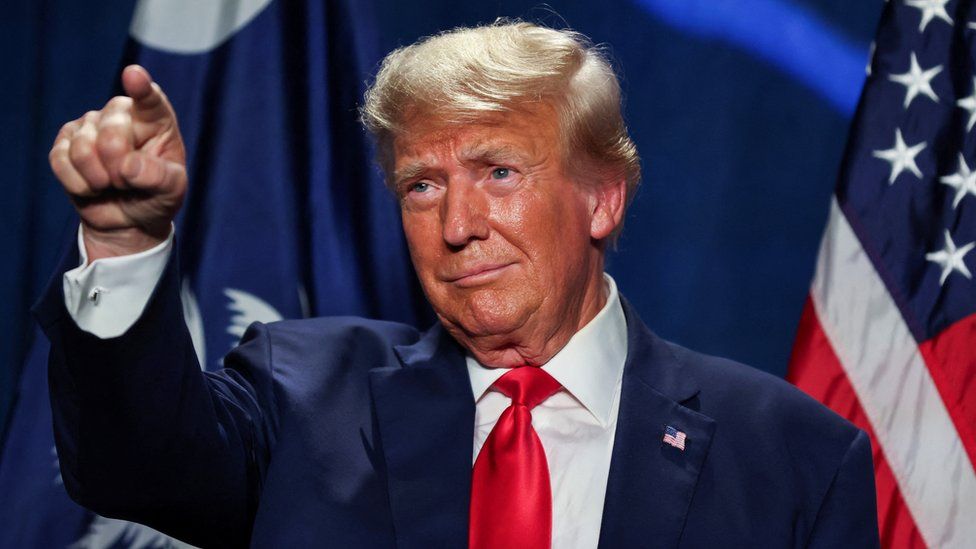 Former U.S. President and Republican campaigner  Donald Trump gestures astatine  a Republican fundraising meal  successful  South Carolina successful  6 August