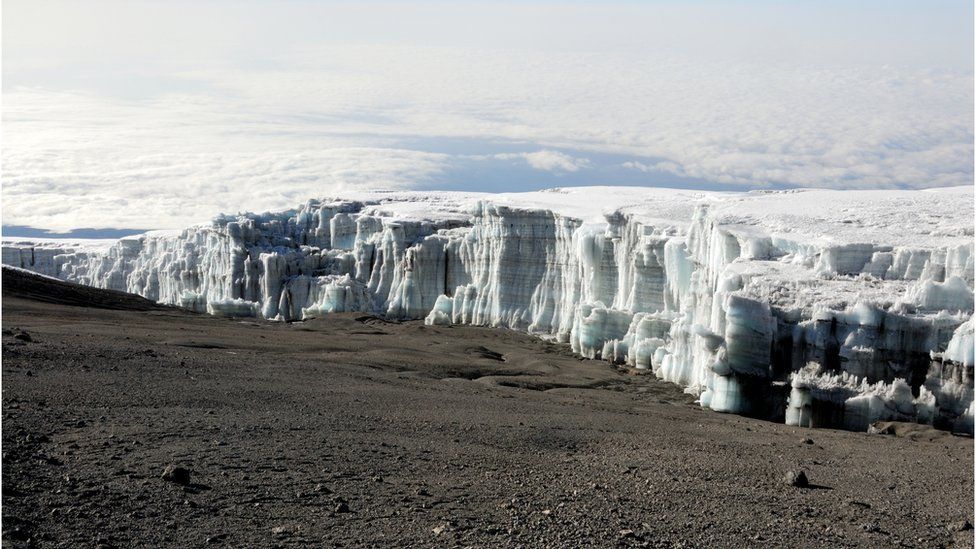 A glacier sitting atop equine   kilimanjaro