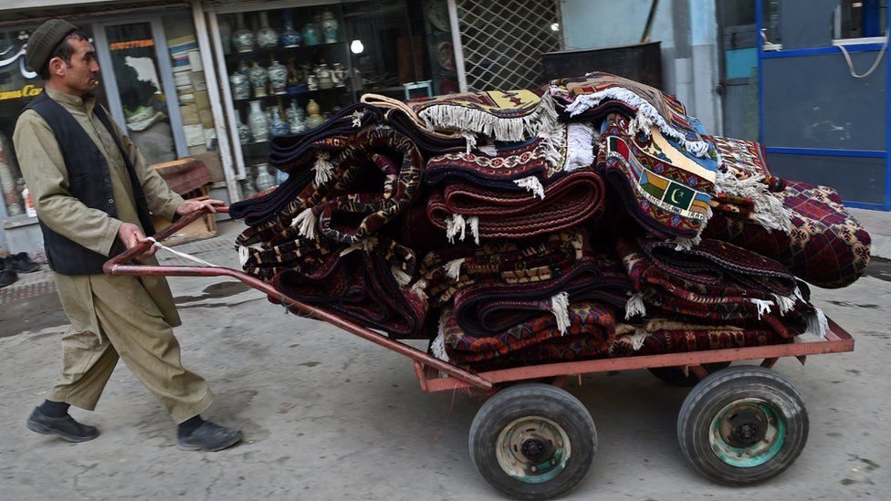 The trade in Afghanistan's famous carpets and rugs has suffered alongside other businesses on Chicken Street with restaurants and sports clubs closing in recent years