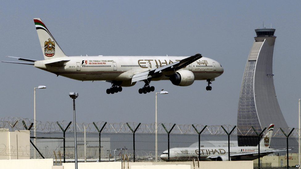 Etihad Airways plane prepares to land at the Abu Dhabi airport in the United Arab Emirates