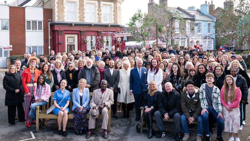 The Prince of Wales and The Duchess of Cornwall during a group photo of cast and crew
