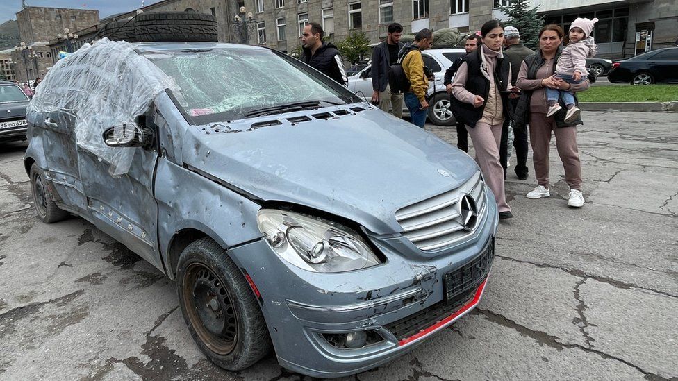 A heavily damaged car in the Armenian town of Goris
