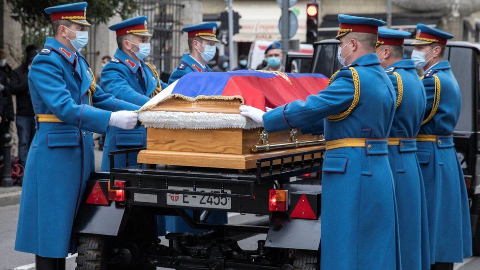 Serbian Army guardsmen carry the casket of Serbia's late Patriarch Irinej, who died after contracting COVID-19, in front of the Belgrade's Archangel Michael cathedral church, in Belgrade, Serbia, November 21, 2020.