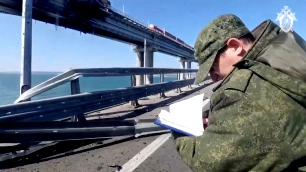 Russian investigator at the blast site on the bridge, 8 October