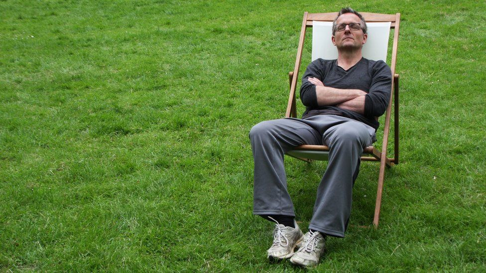 Michael Mosley in a deckchair with his eyes shut