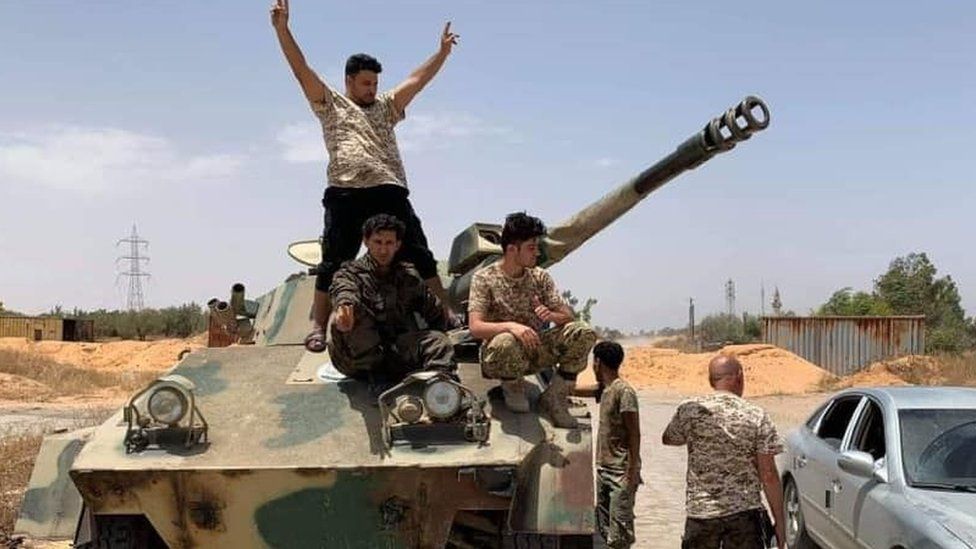 Libyan soldiers capture a tank from the warlord Gen Haftar's militias in Tripoli on 4 June 2020.
