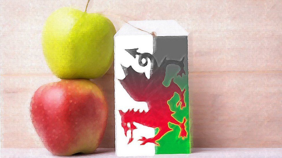 Apples and the welsh flag on a label