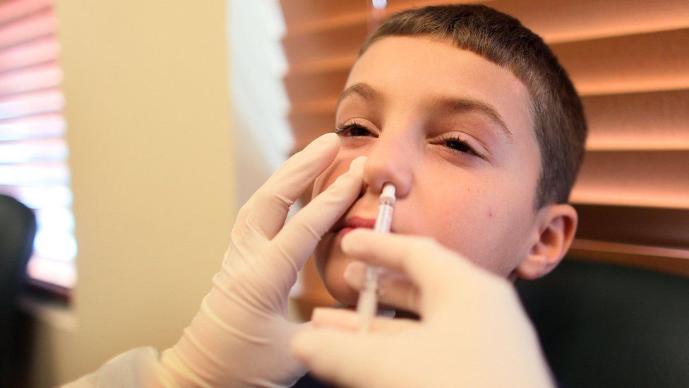 A child having the flu vaccine
