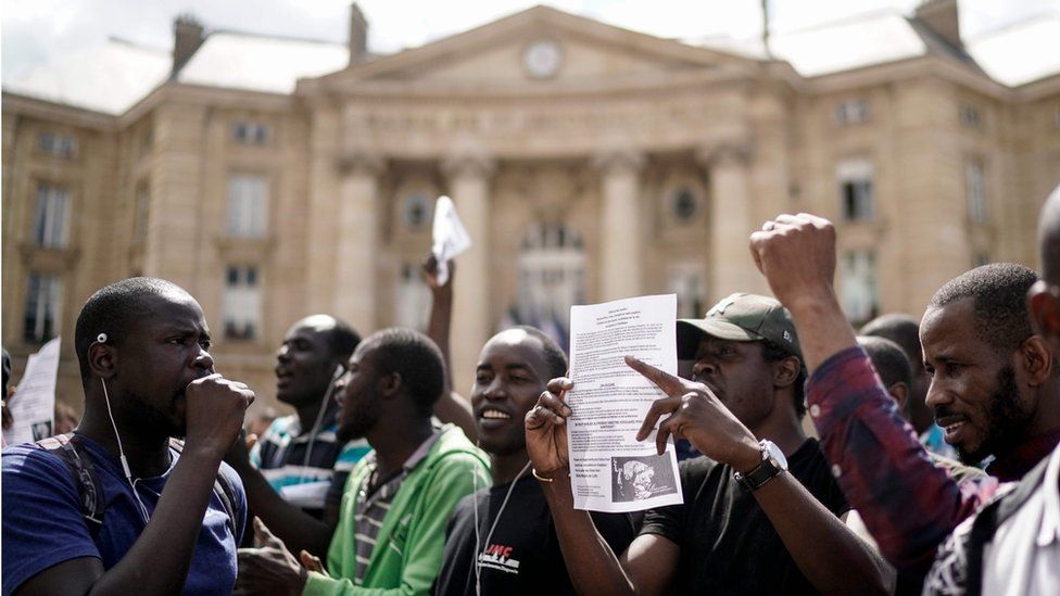Undocumented migrants demonstrate in front of the Panthéon in Paris to ask for the regularisation of their situation