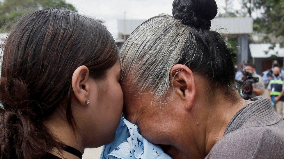 Relatives of inmates react as they wait for news about their loved ones outside the Centro Femenino de Adaptacion Social (CEFAS) women's prison following deadly riot in Tamara, on the outskirts of Tegucigalpa, Honduras, June 20,