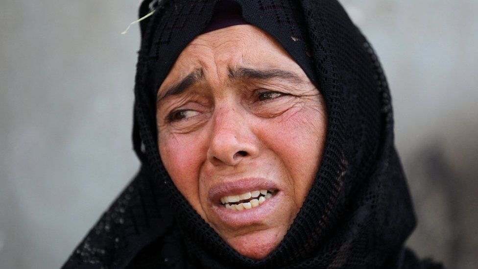 Mohamed Atef's mother, cries as her son is missing in Libya after Storm Daniel hit the country, at Al Sharief village in Bani Swief province, Egypt