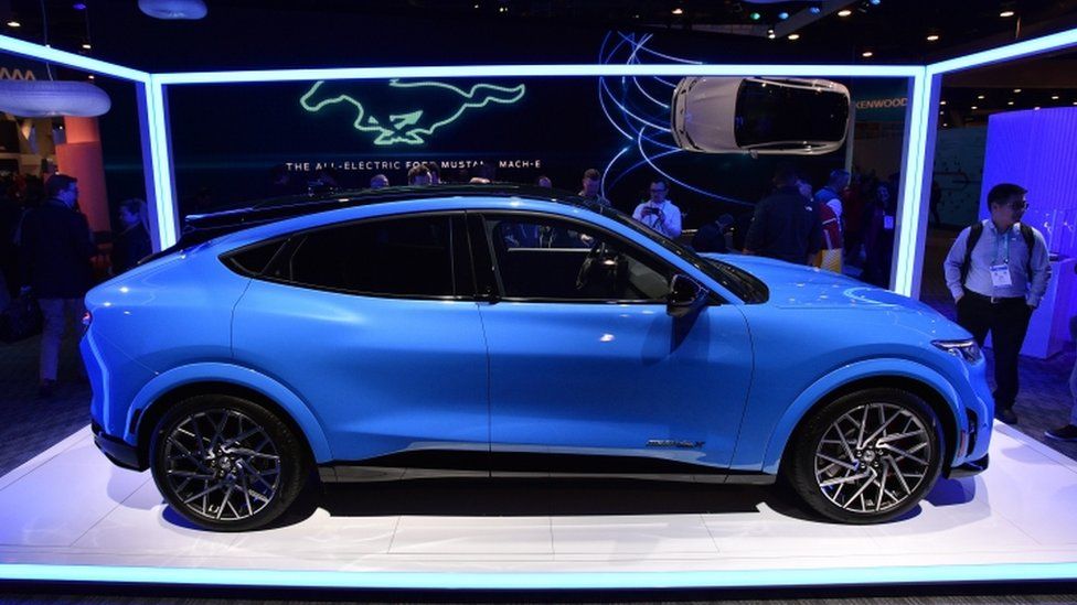 A blue Ford Mustang Mach E GT electric car