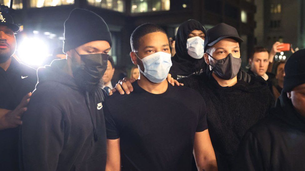 Jussie Smollett (second left) leaving Cook County jail in Chicago