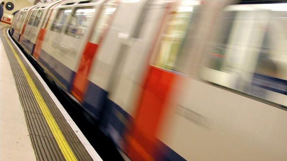 Underground train leaving station