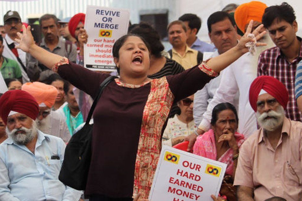 An account holders of the Punjab and Maharashtra Co-operative Bank (PMC Bank) shout slogans during a protest against Reserve Bank of India (RBI) in Mumbai, India on 30 October 2019.