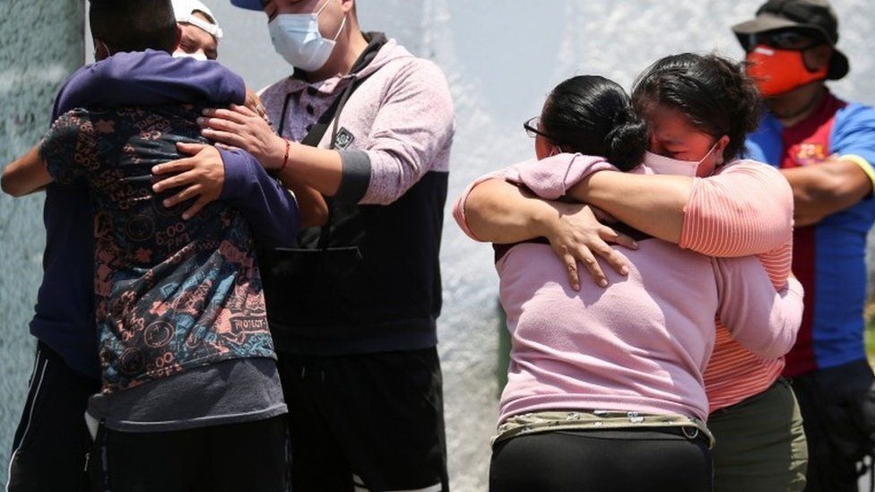 Relatives of the victims react outside the Prosecutor"s Office in Iztapalapa neighbourhood, after an overpass of the metro partially collapsed with train cars on it in Mexico City