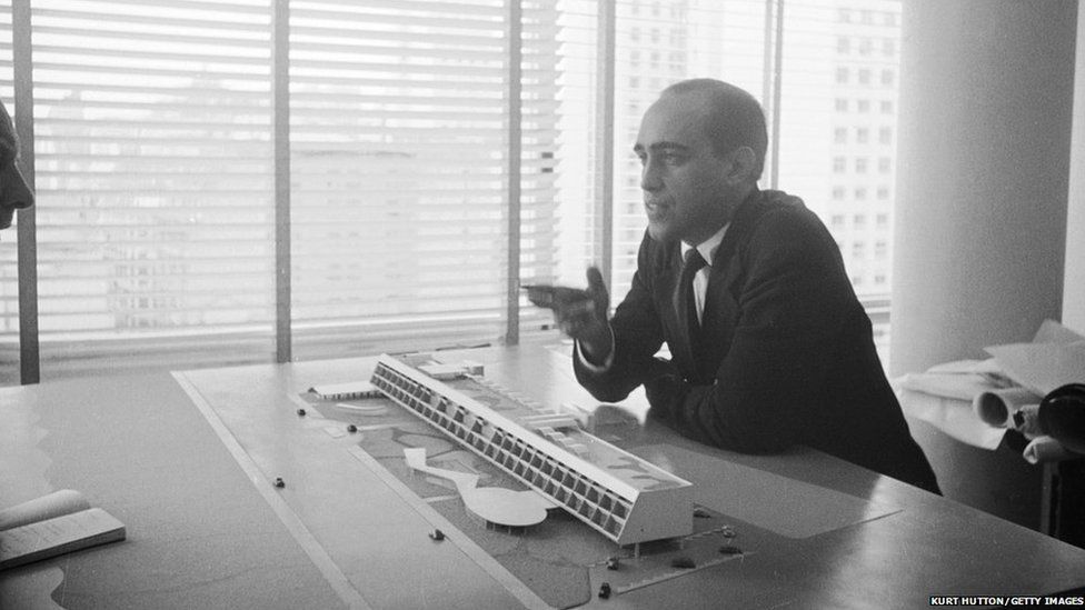Brazilian architect Oscar Niemeyer discusses one of his designs, pictured on 3 June 1950. Original Publication : Picture Post - 4971 - Niemeyer: A South American Revolutionary