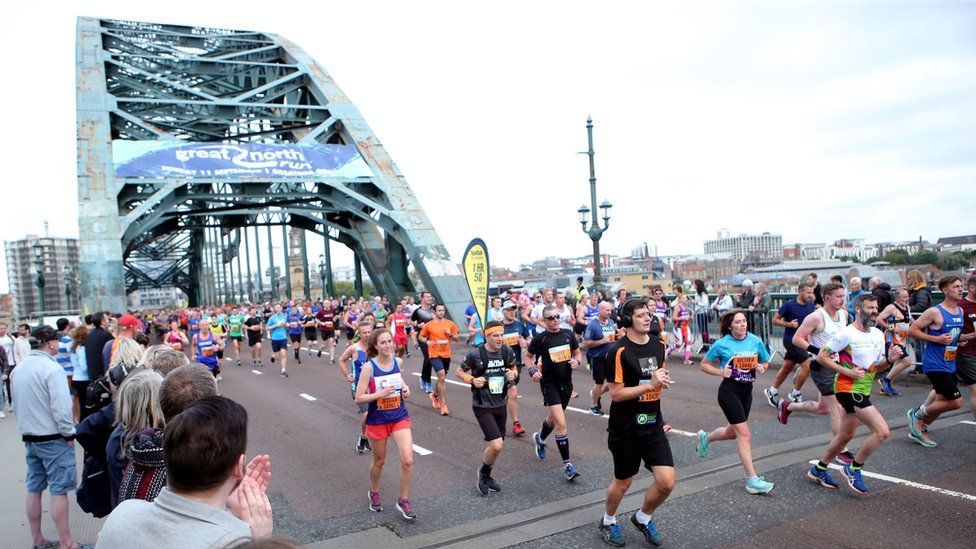 Runners cross the Tyne Bridge
