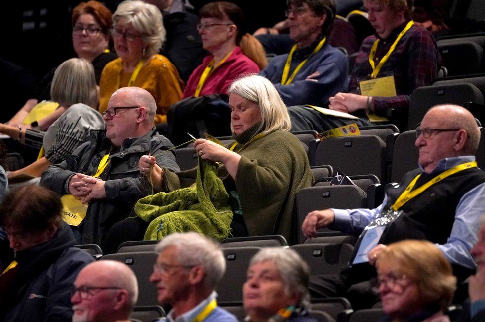 Woman knitting at SNP conference