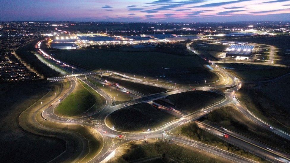 Aerial view of the new roundabout lit up by street lights as dawn breaks