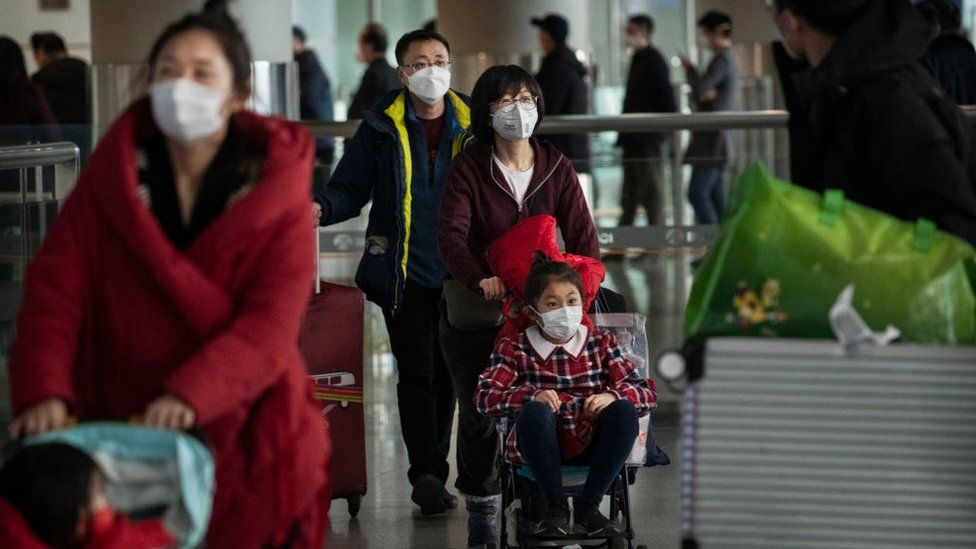Passengers at Beijing Airport