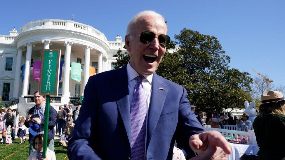 US President Joe Biden greets guests at the Easter Egg Roll, a tradition dating back to 1878, on the South Lawn of the White House in Washington