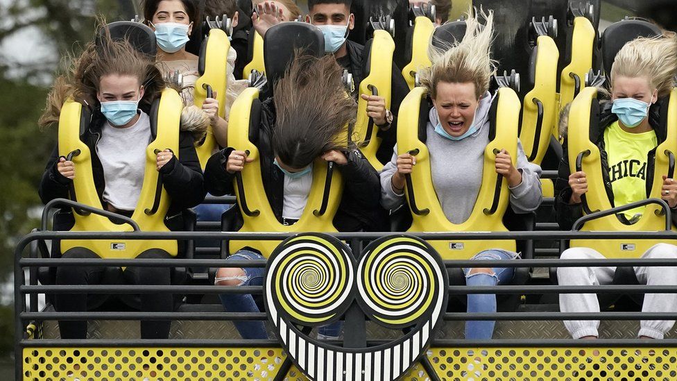 Members of the public wear masks on The Smiler rollercoaster at Alton Towers